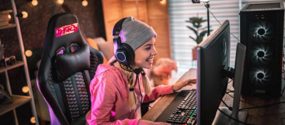 Girl plays video game online and streaming   at home
